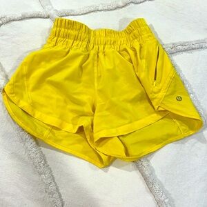 LULULEMON Size 2 Track that bright yellow shorts 3”